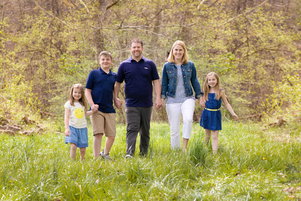 family portraits in west virginia, family walking through field